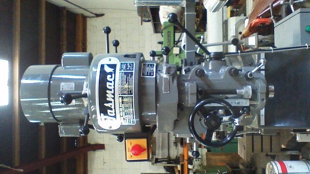 Turret milling machine New(bridgeport) Tasmac X6323A single phase NT30 3 axis DRO, 1 axis power feed, Table 1250x230mm