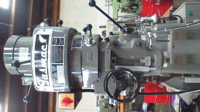 Turret milling machine New(bridgeport) Tasmac X6323A single phase NT30 3 axis DRO, 1 axis power feed, Table 1250x230mm